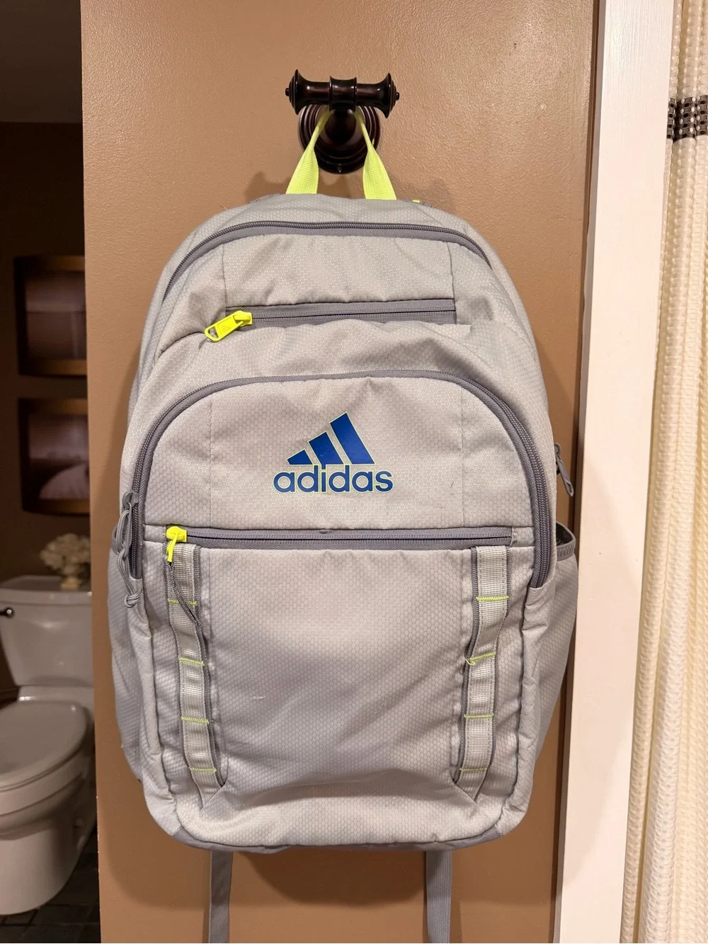 adidas Light Gray Backpack with Blue Logo and Neon Yellow Accents